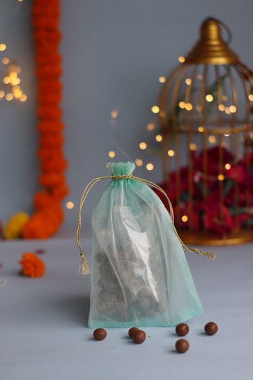 Tissue Potli of 100gms Butterscotch Chocolate Balls