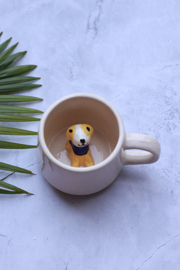 Ceramic cup with dog inside