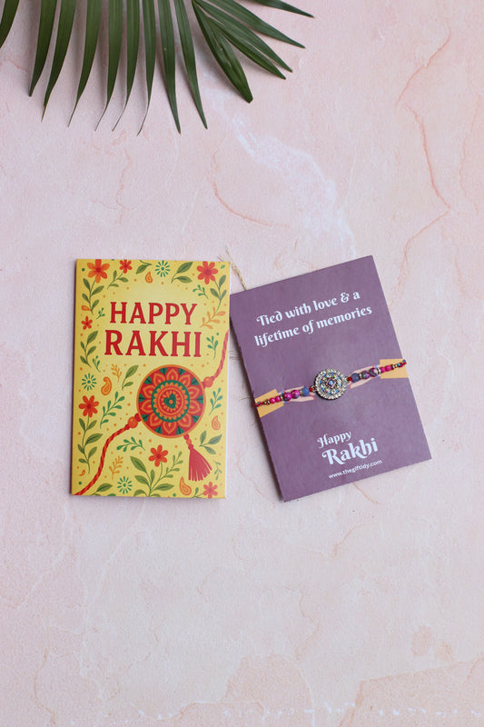 Two cards with 'Happy Rakhi' text and a rakhi bracelet on a light pink background.